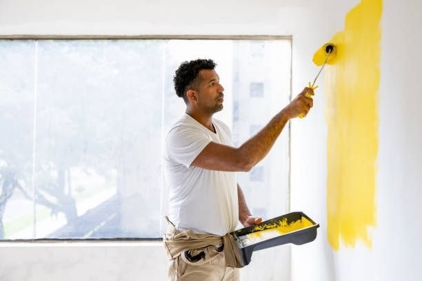 Painter in Karve Nagar Pune doing wall painting work